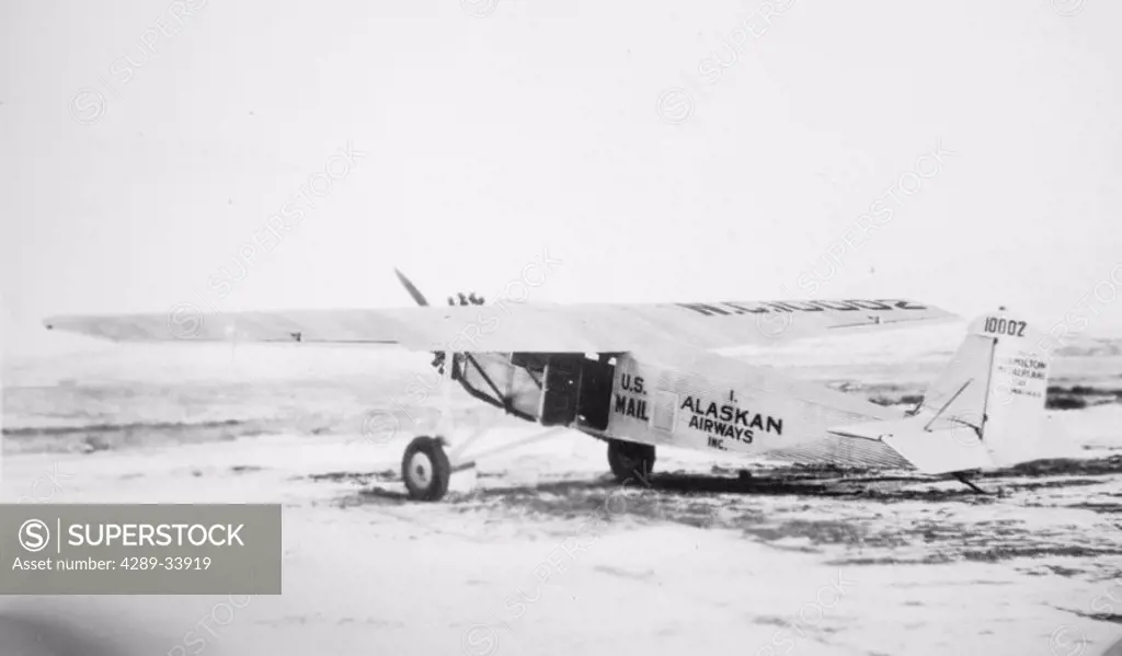 Historical image of Alaskan Airways Inc US mail plane on ground Alaska