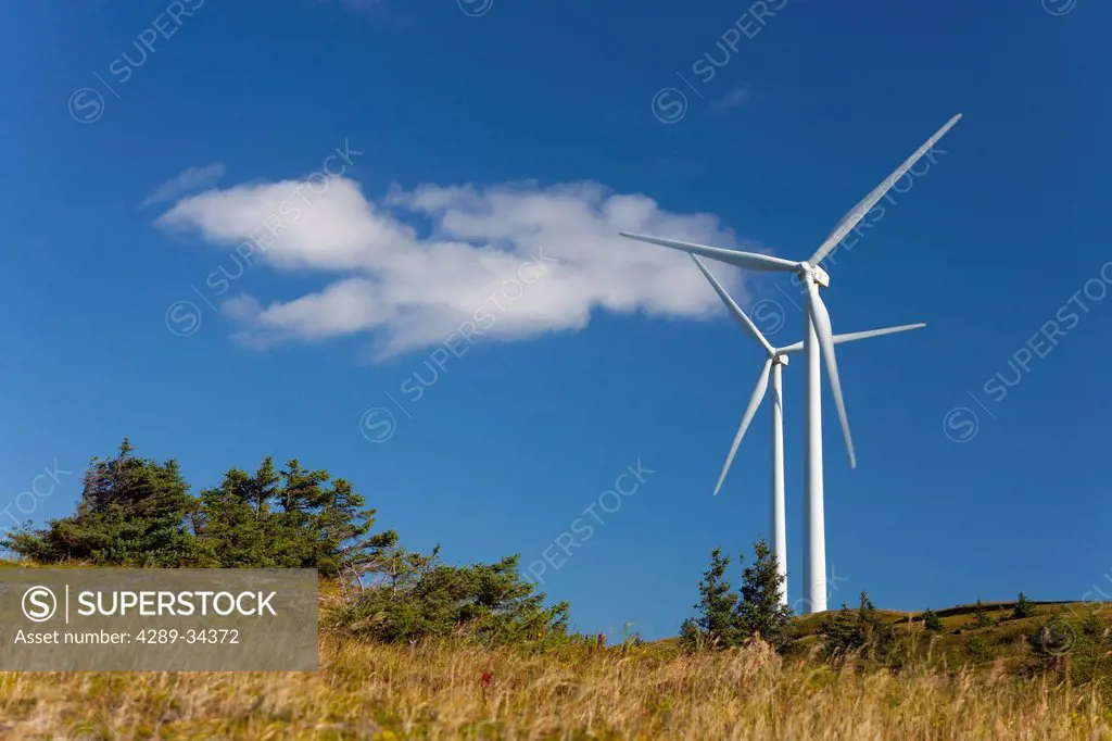 Pillar Mountain Wind Project wind turbines stand on Pillar Mountain on Kodiak Island on a sunny day, Southwest Alaska, Autumn