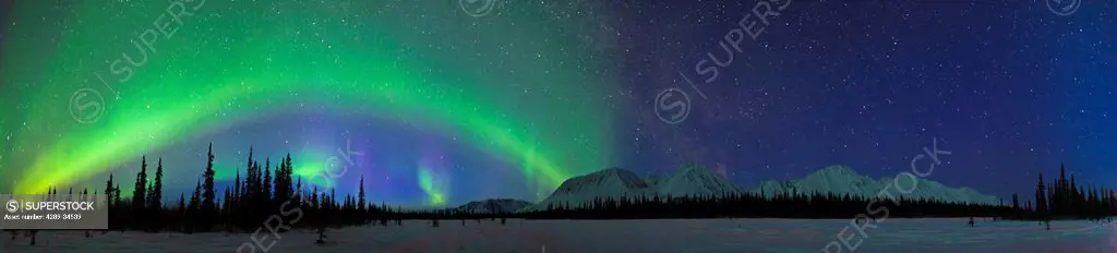 View of Northern Lights over the foothills of the Alaska Range in Broad Pass, Southcentral Alaska, Winter