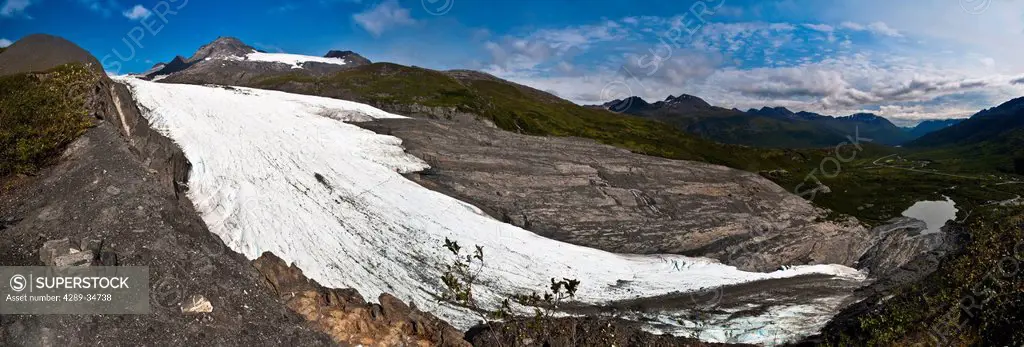 A panoramic image of Worthington Glacier taken from the Ridge Trail with Richardson Highway in the background, Southcentral Alaska, Summer