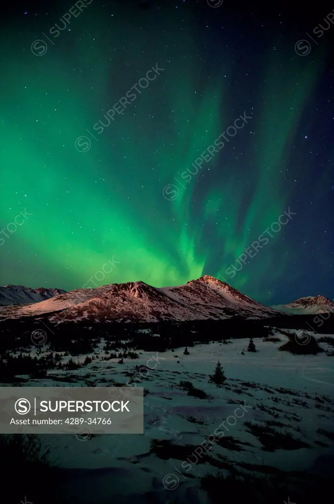 The Northern Lights over Wolverine Peak in the Chugach State Park near Powerline Pass, Anchorage, Southcentral Alaska, Winter