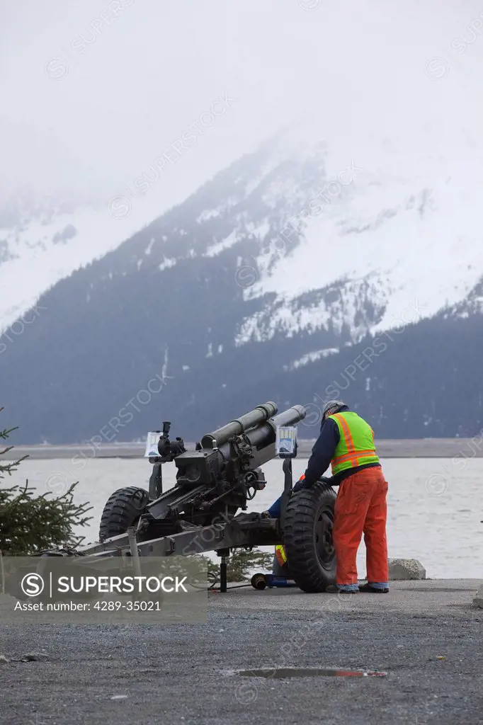 Alaska Department of Transportation workers use a Howitzer cannon to initiate controlled avalanches along the Seward Highway, Southcentral Alaska, Spr...