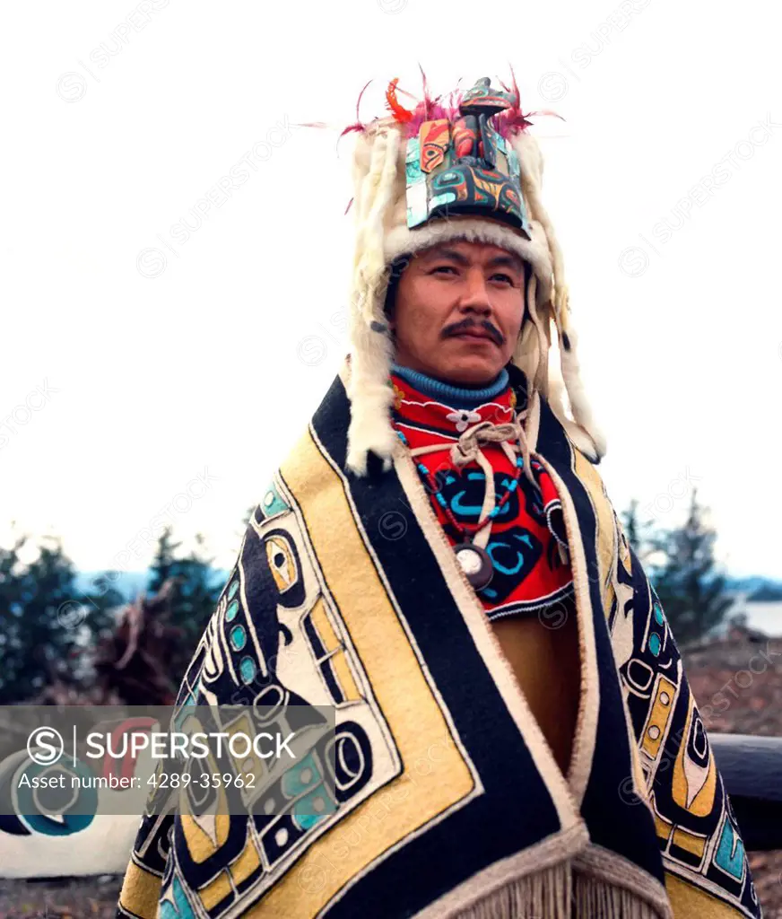 Portrait of renowned wood and totem carver Nathan Jackson dressed in traditional regalia at a totem raising ceremony in Kake, Southeast Alaska, Summer