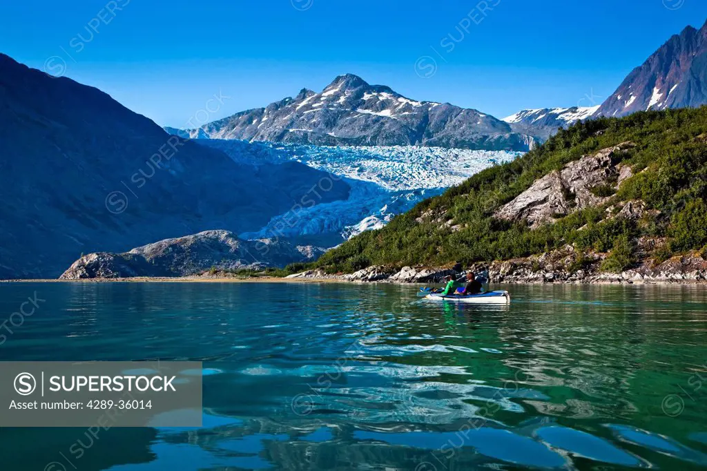 Sea Kayakers paddling to Riggs Glacier in Muir Inlet, Glacier Bay National Park & Preserve, Southeast Alaska, Summer