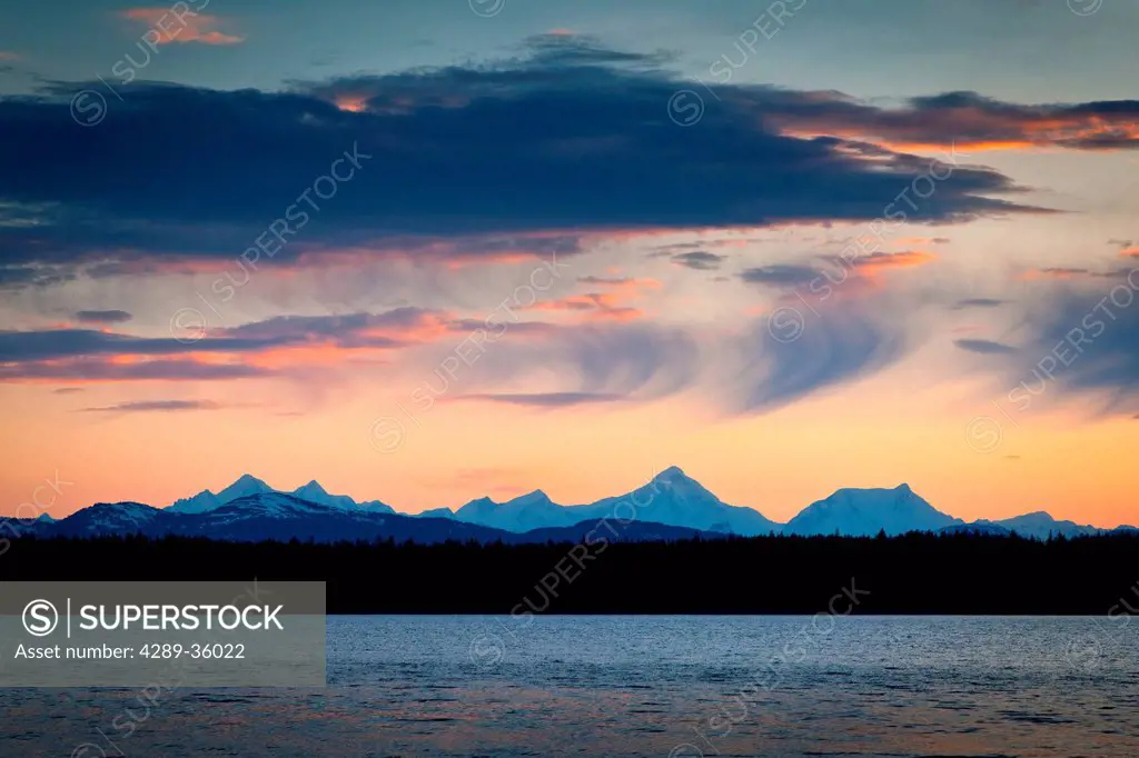 Sunset scenic of Fairweather Mountains as seen from Bartlett Cove, Gustavus, Glacier Bay National Park & Preserve, Southeast Alaska, Summer