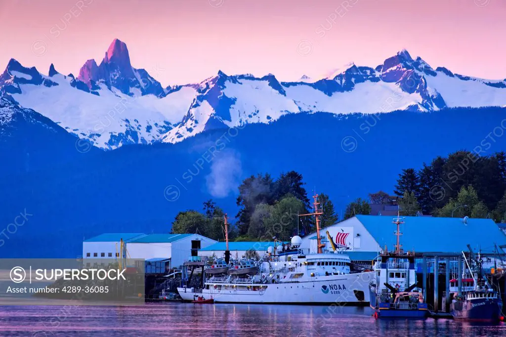 Sunset over North Harbor with alpenglow on coast mountains and Devils Thumb, Petersburg, Southeast Alaska, Summer