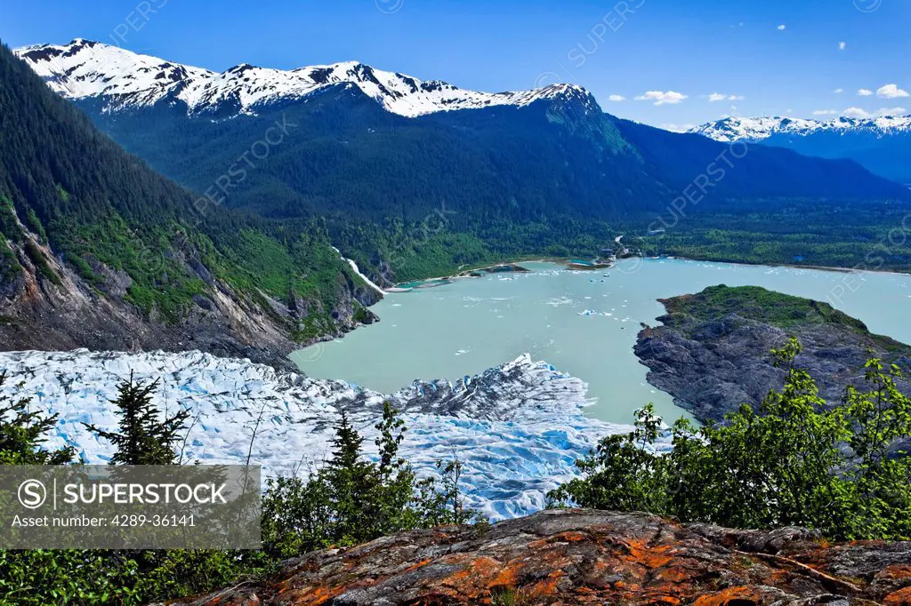 Scenic view overlooking Mendenhall Glacier and Mendenhall Lake from West Glacier Trail, Juneau, Southeast Alaska, Summer