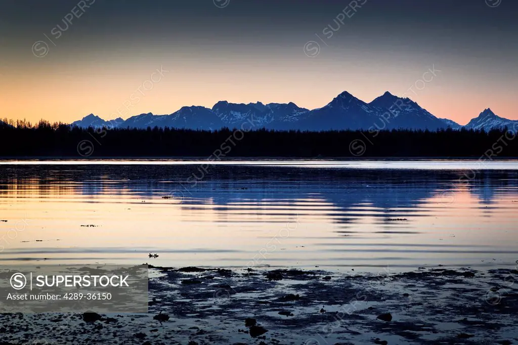 Scenic sunset view of Bartlett Cove, Glacier Bay National Park & Preserve, Southeast Alaska, Summer