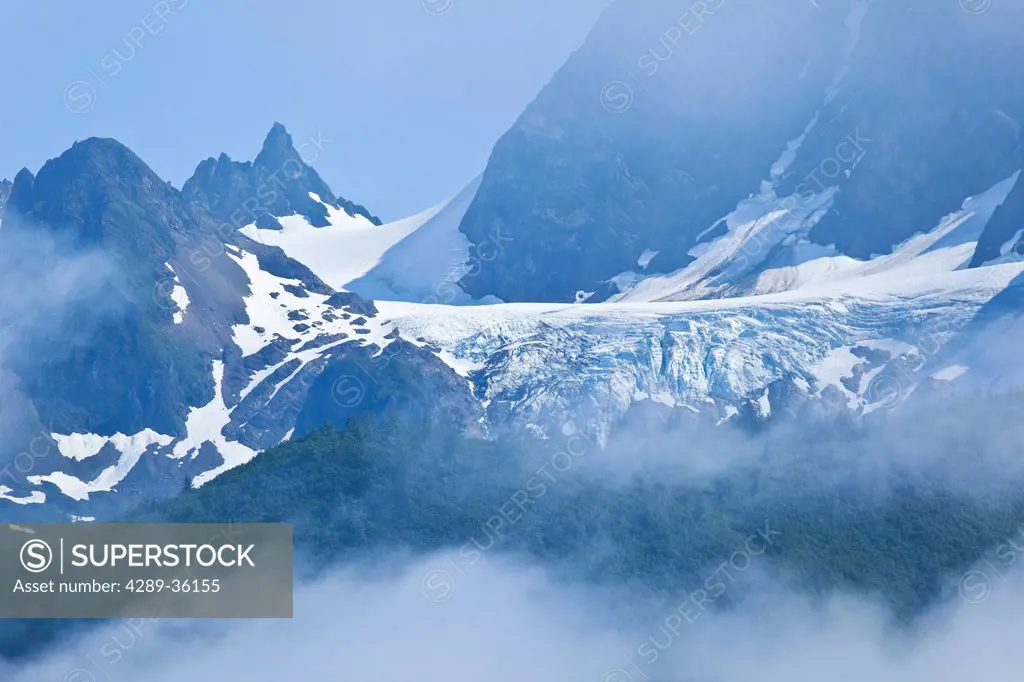 Scenic view of a hanging glacier on a coastal mountain above Muir Inlet, Glacier Bay National Park & Preserve, Southeast Alaska, Summer