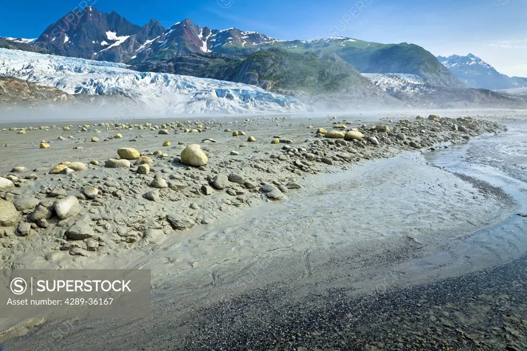 Scenic view of Riggs Glacier reflecting on the water of Muir Inlet, Glacier Bay National Park & Preserve, Southeast Alaska, Summer