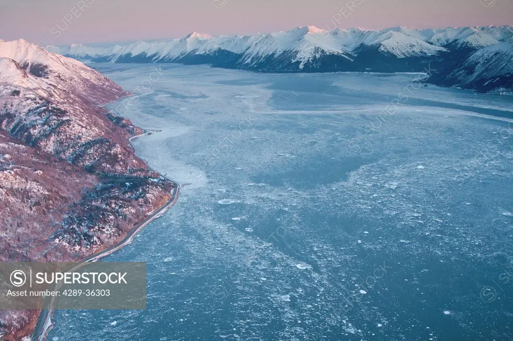 Aerial view of the Turnagain Arm and Seward Highway south of Anchorage, Southcentral Alaska, Winter