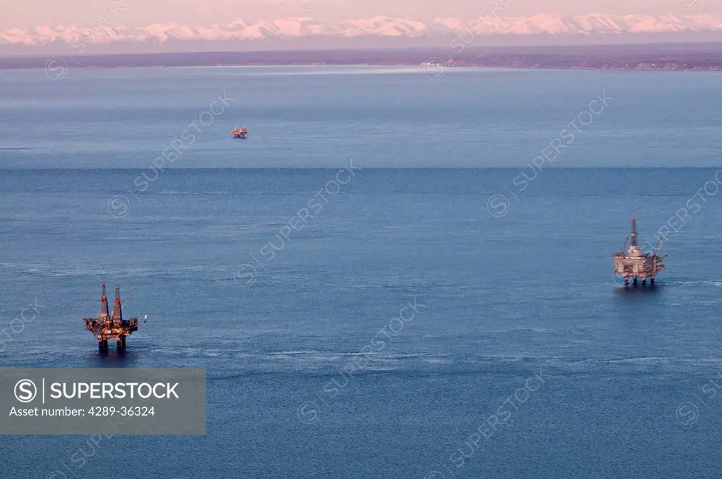 Aerial evening view of oil platform in Cook Inlet, Southcentral Alaska, Winter