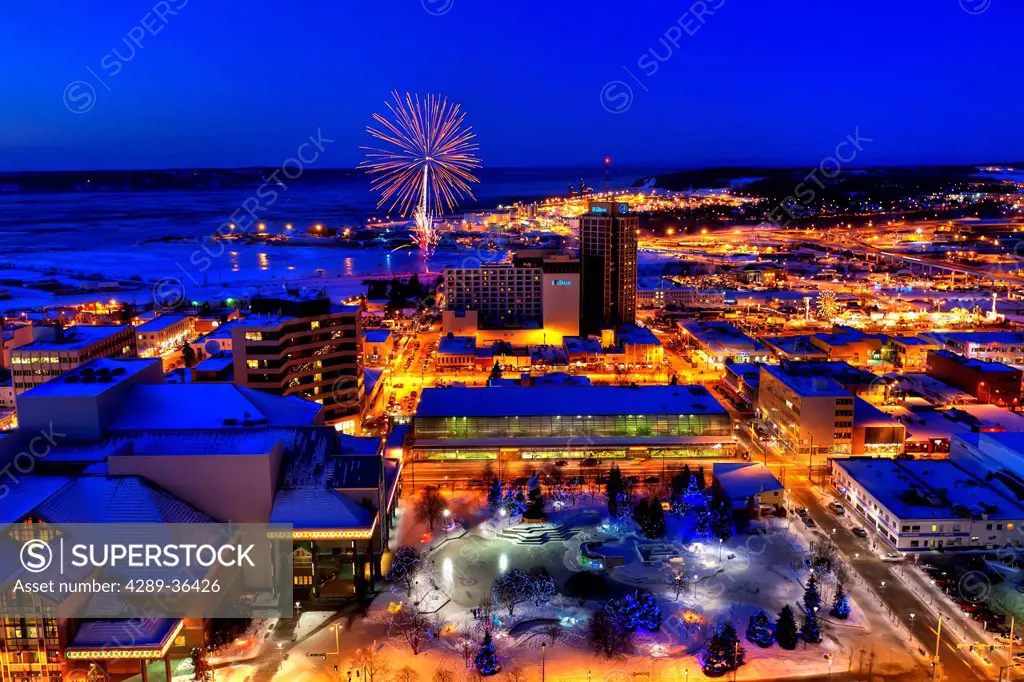 Rooftop view of the Fur Rondy fireworks over downtown Anchorage, Southcentral Alaska, Winter