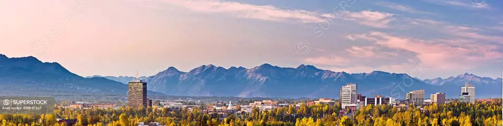 Panorama View Of Anchorage's Midtown Skyline With The Chugach Mountains In The Background, Southcentral Alaska, Autumn/N
