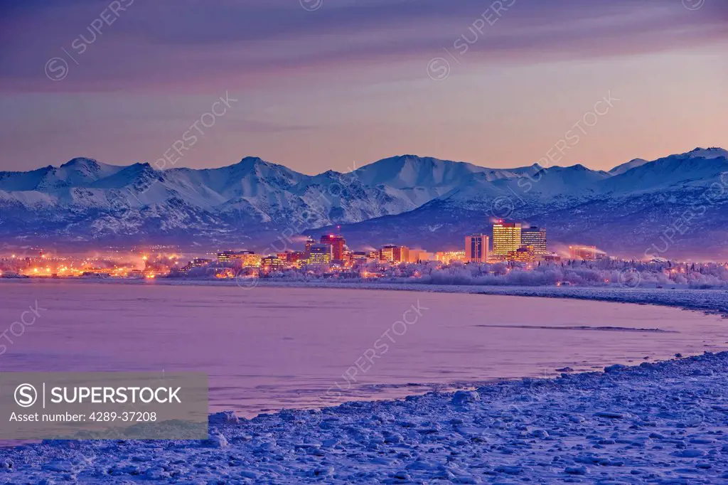 Panorama View Of The Anchorage Skyline Just Before Dawn As Seen From Earthquake Park During Winter, Southcentral Alaska