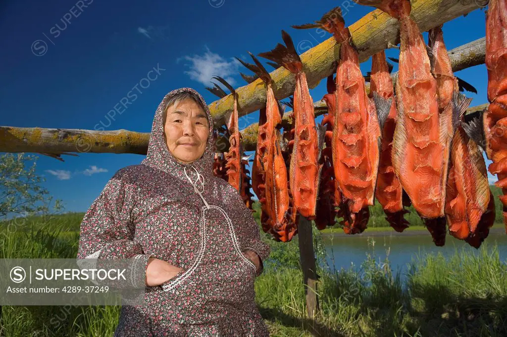 Portrait Of Elder Native Yupik Woman Near Fish Drying Rack Kuskokwim River Akiachak Western Alaska