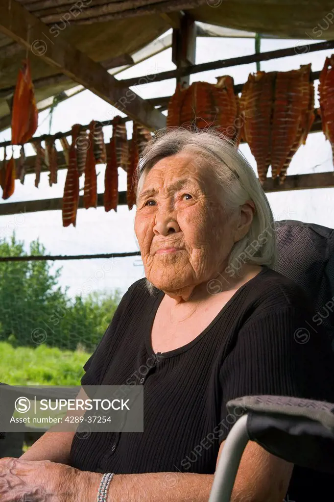 Elderly Native Yupik Woman Sitting Inside Drying Shed Kuskokwim River Akiak Western Alaska Summer