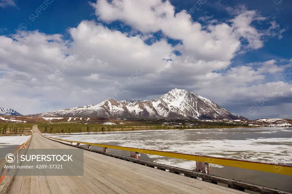 The Denali Highway Bridge Over The Susitna River With Clearwater Mountains In The Background, Southcentral Alaska, Spring