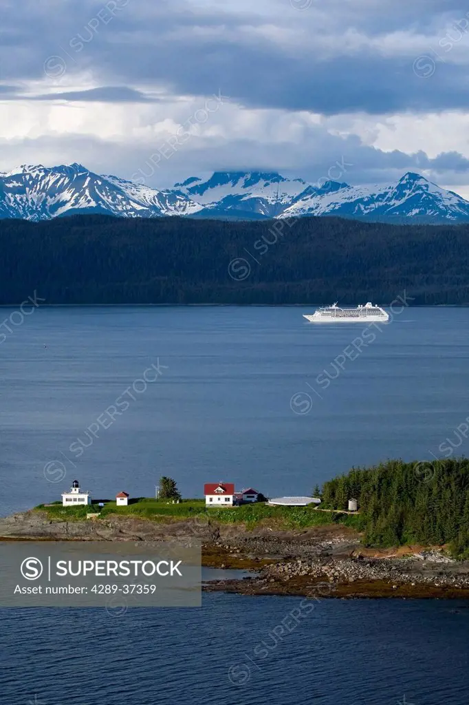 Aerial View Of Point Retreat Light House At The Tip Of Mansfield Penninsula With Admiralty Island And A Cruise Ship In The Background, Southeast, Alas...