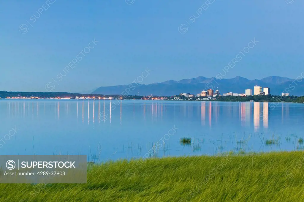 View Of Downtown Anchorage Skyline Across Knik Arm W/Reflection @ Sunset Southcentral Alaska Summer