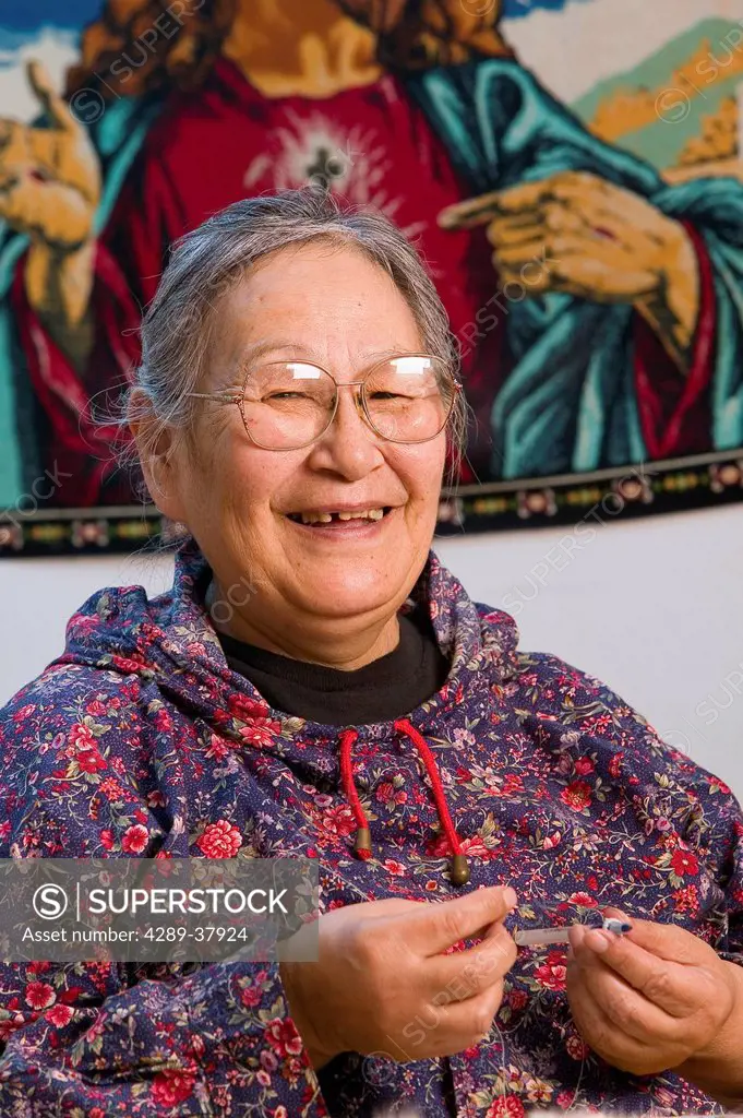 Native Female Yupik Elder Sitting @ Kitchen Table Doing Beadwork Akiachak Western Alaska Indoors