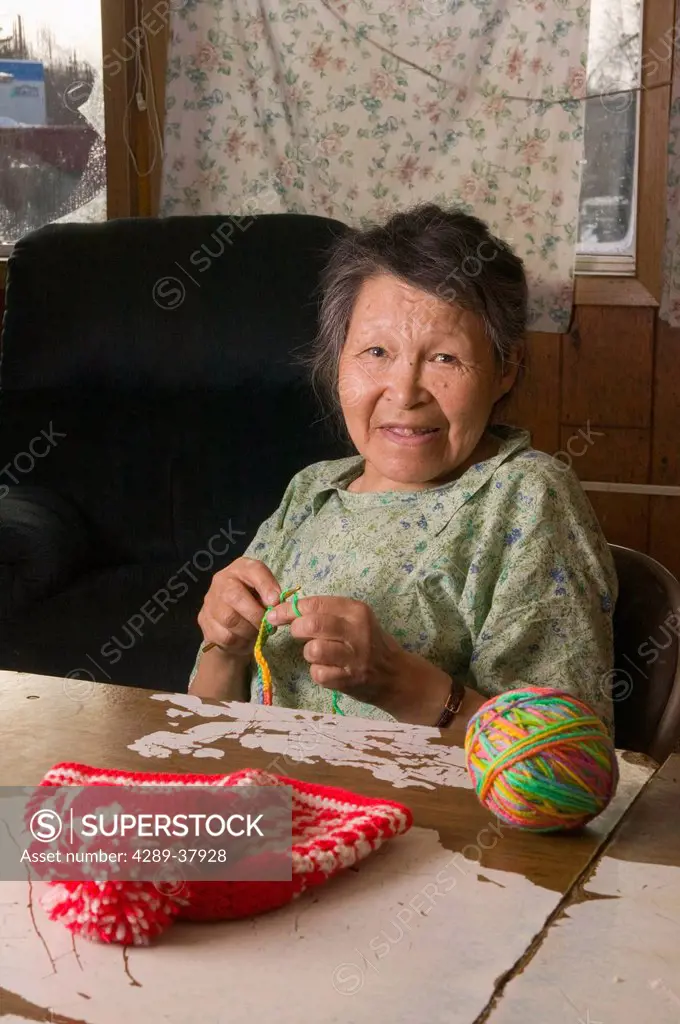 Elder Native Yupik Woman Knitting @ Her Kitchen Table W/Ball Of Yarn & Stocking Hat Tuluksak Ak