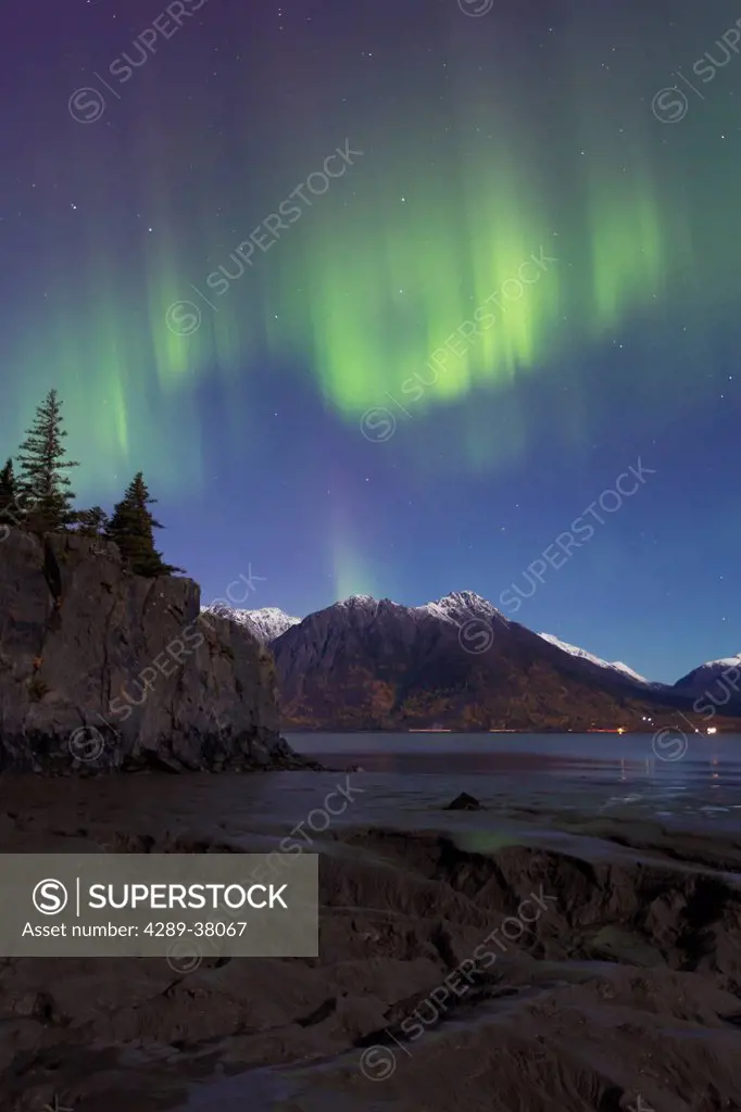 Northern Lights Dancing Above The Chugach Mountains And Mudflats Of Turnagain Arm From The Hope Highway In Autumn Southcentral Alaska; Alaska United S...