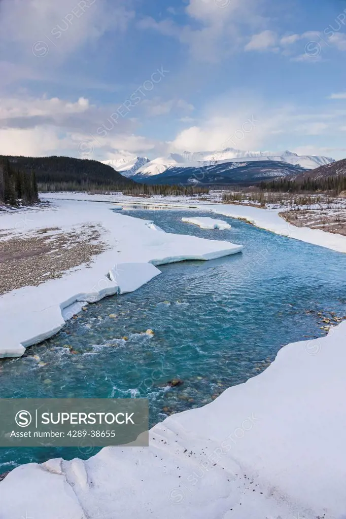 Early morning view of the Racing River where it crosses the Alcan Highway West of Fort Nelson, Canadian Rockies, early spring, Northern British Columb...