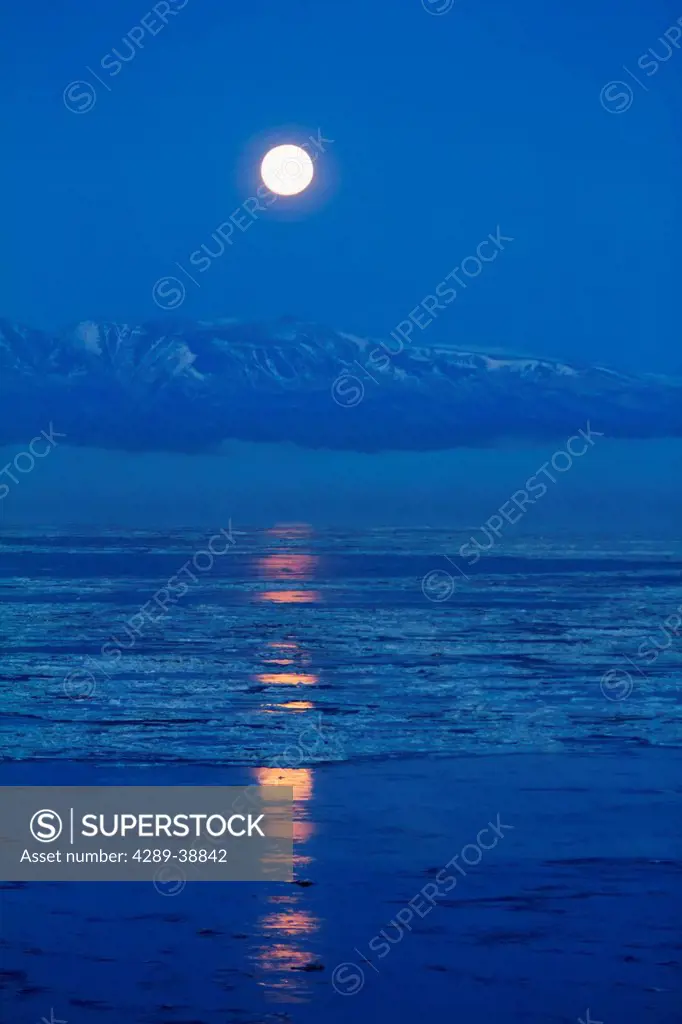 Full moon at Point Woronzof in West Anchorage in Autumn with view of Sleeping Lady across Cook Inlet,Southcentral Alaska, Winter