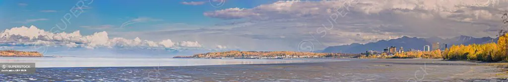 Late afternoon light light on the Anchorage skyline and Knik Arm, Port MacKenzie in the distance, fall colors, Anchorage, Southcentral Alaska, USA.