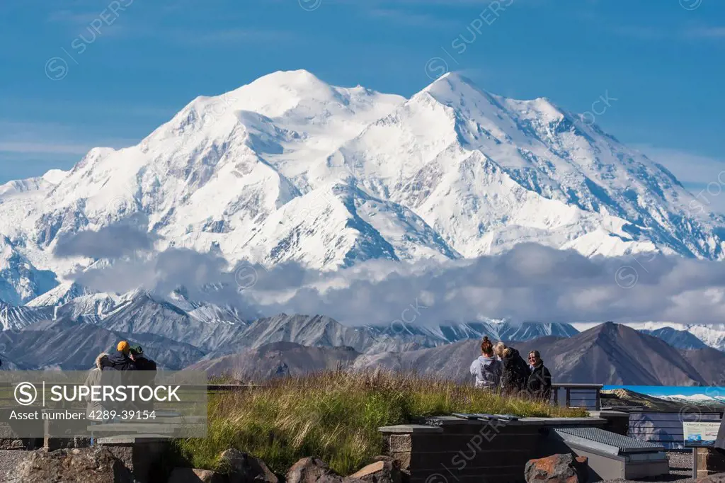 Tourists view Mt. McKinley on a sunny day from Eielson Vistor Center, Denali National Park and Preserve, Interior Alaska, Summer