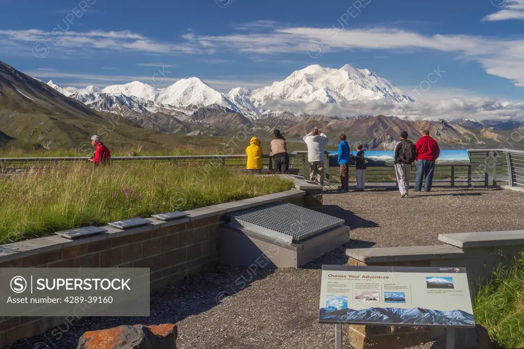 Tourists view Mt. McKinley on a sunny day from Eielson Vistor Center, Denali National Park and Preserve, Interior Alaska, Summer