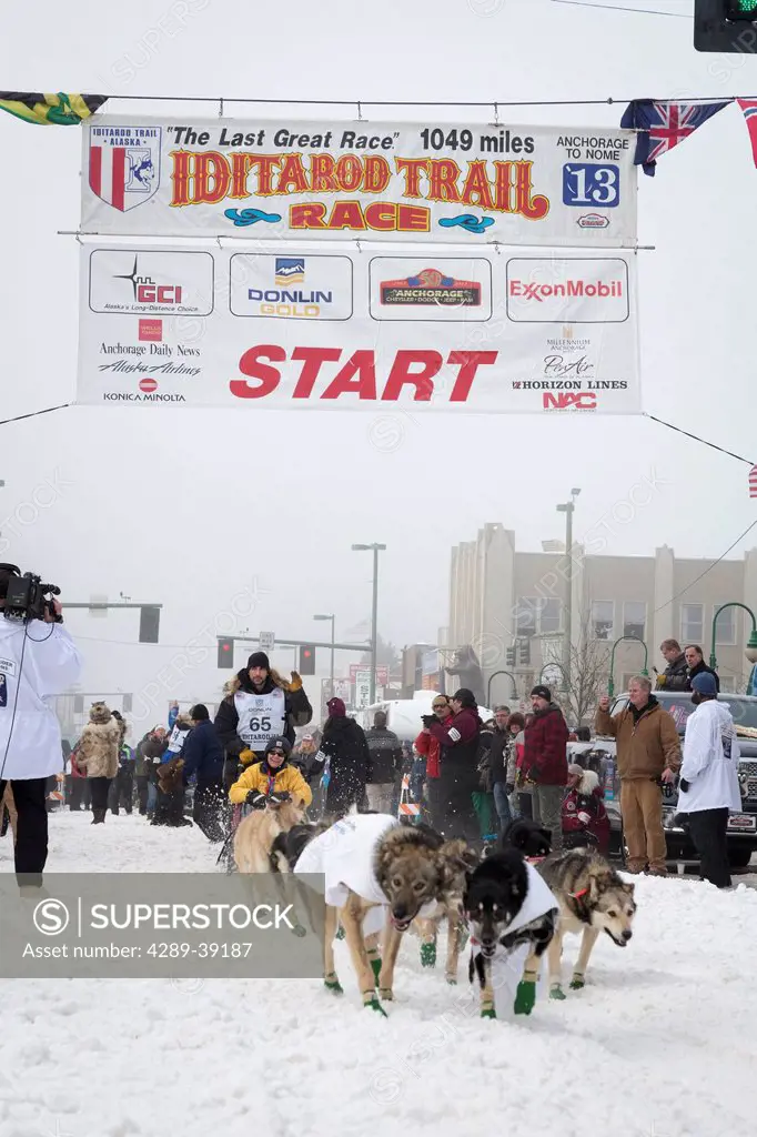 Richie Diehl and team leave the ceremonial start line at 4th Avenue and D street in downtown Anchorage during the 2013 Iditarod race.