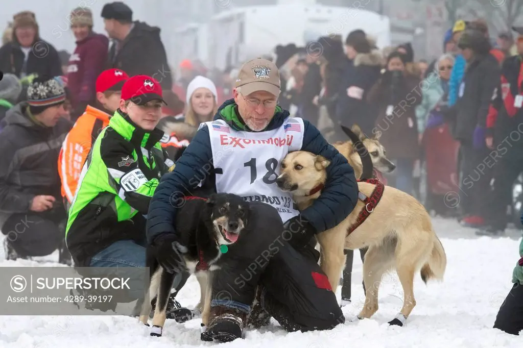 Jeff King and team leave the ceremonial start line at 4th Avenue and D street in downtown Anchorage during the 2013 Iditarod race.