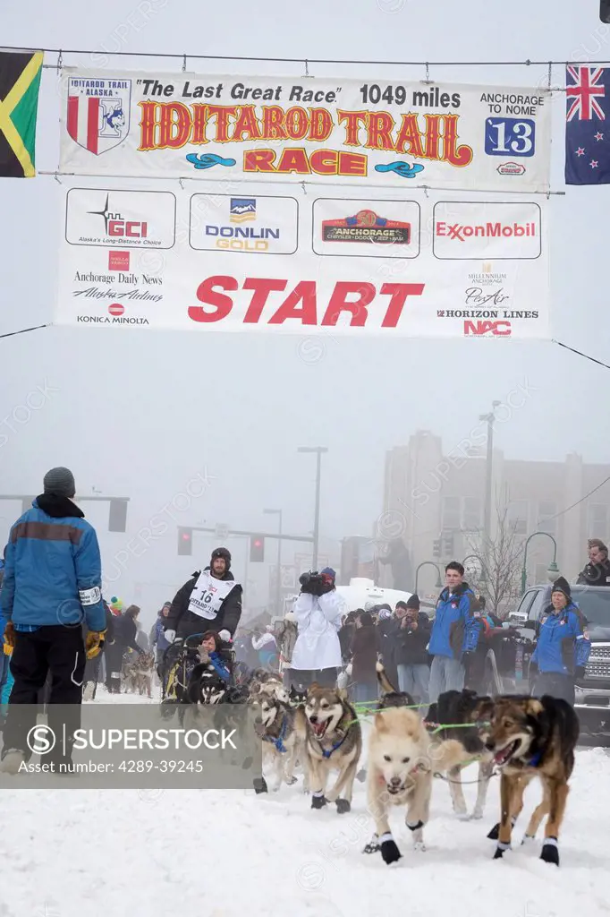 Nicolas Petit and team leave the ceremonial start line at 4th Avenue and D street in downtown Anchorage during the 2013 Iditarod race.