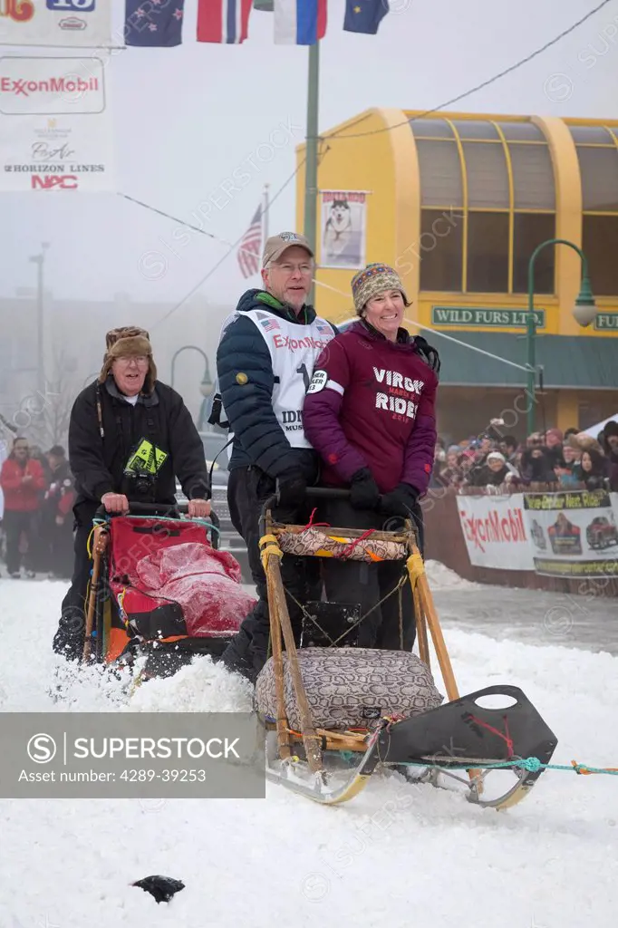 Jeff King and team leave the ceremonial start line at 4th Avenue and D street in downtown Anchorage during the 2013 Iditarod race.
