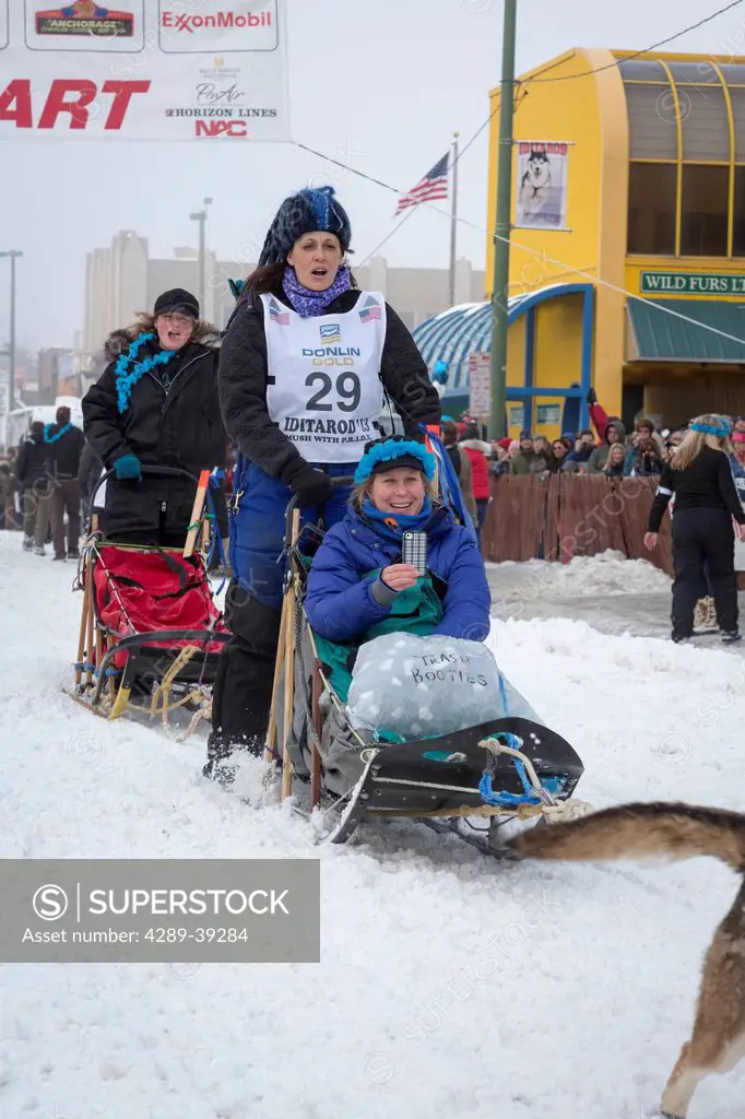 Karin Hendrickson and team leave the ceremonial start line at 4th Avenue and D street in downtown Anchorage during the 2013 Iditarod race.