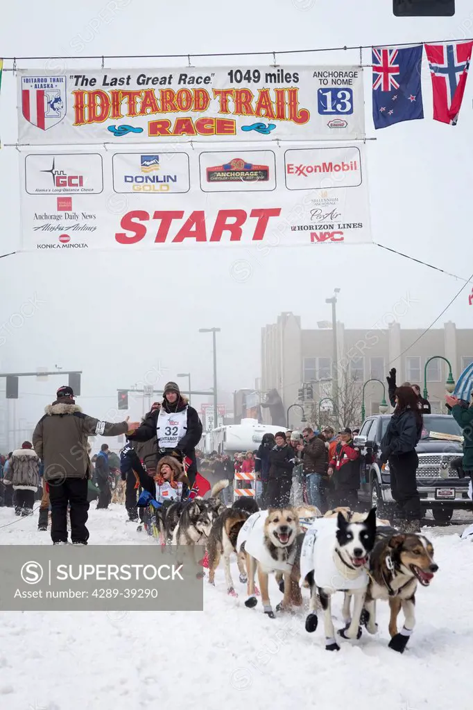 Joar Leifseth Ulsom and team leave the ceremonial start line at 4th Avenue and D street in downtown Anchorage during the 2013 Iditarod race.