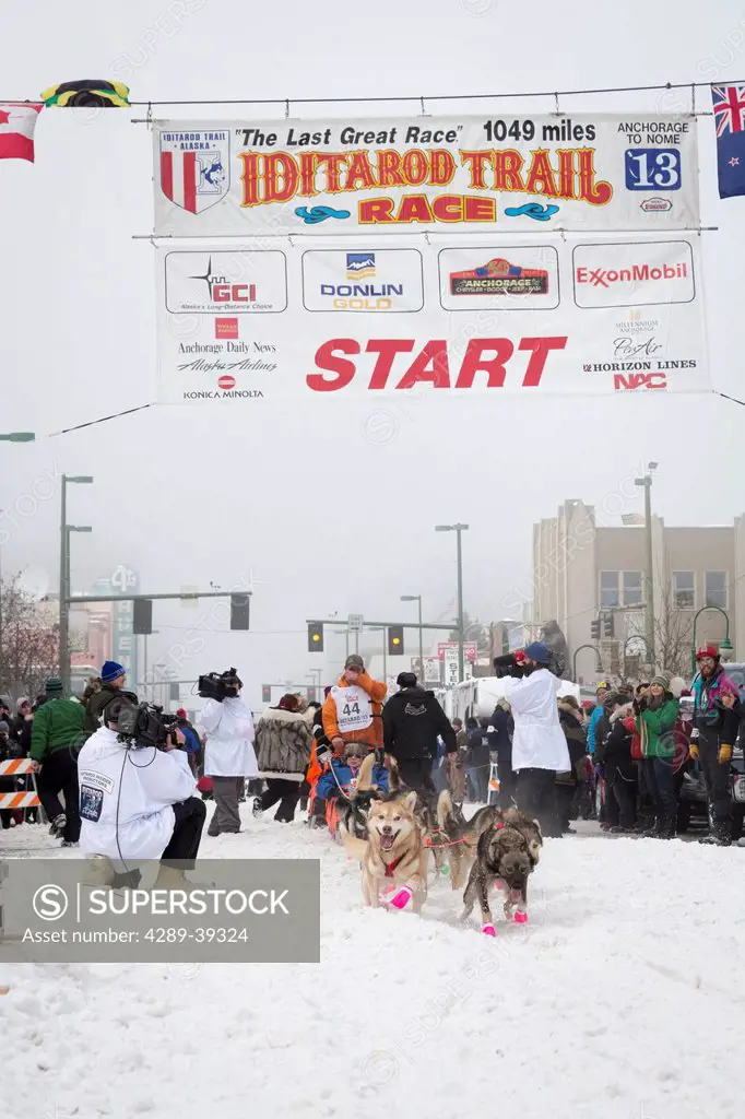 Jake Berkowitz and team leave the ceremonial start line at 4th Avenue and D street in downtown Anchorage during the 2013 Iditarod race.