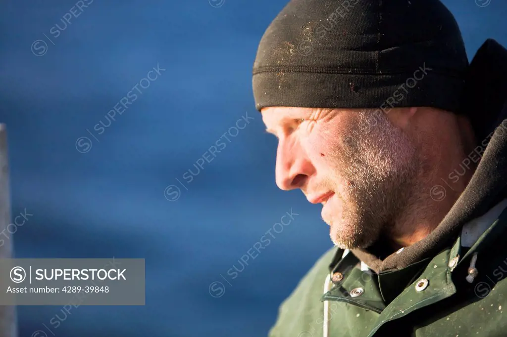 Portrait of Jens Klaar commercial halibut fishing in Ikatan Bay near False Pass, Southwest Alaska, summer.