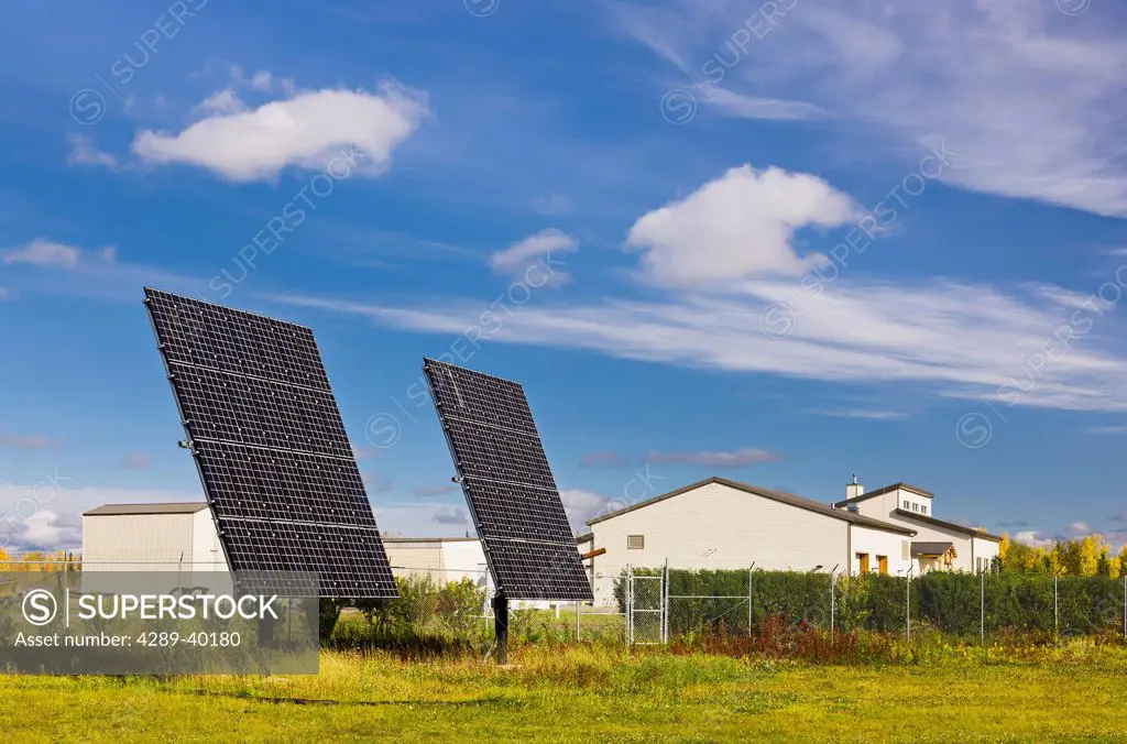 Exterior photograph of the photovoltaic solar array panels that provide the Chena River Lakes District Flood Control Project Visitor Center with elect...