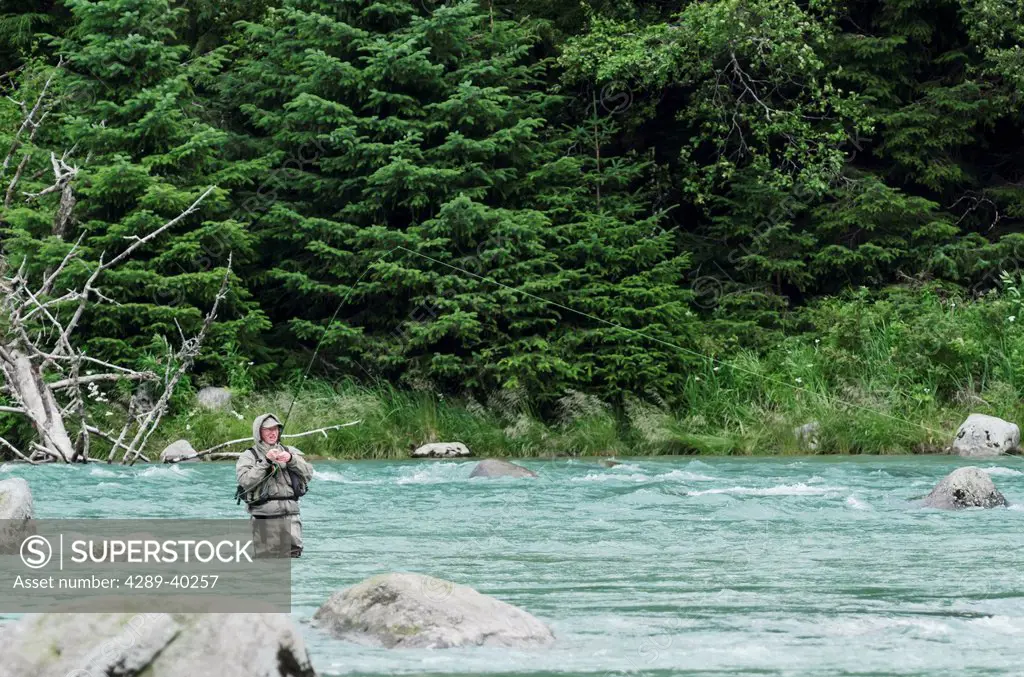 Fly fishing for sockeye salmon in Chikoot River near Haines, Alaska