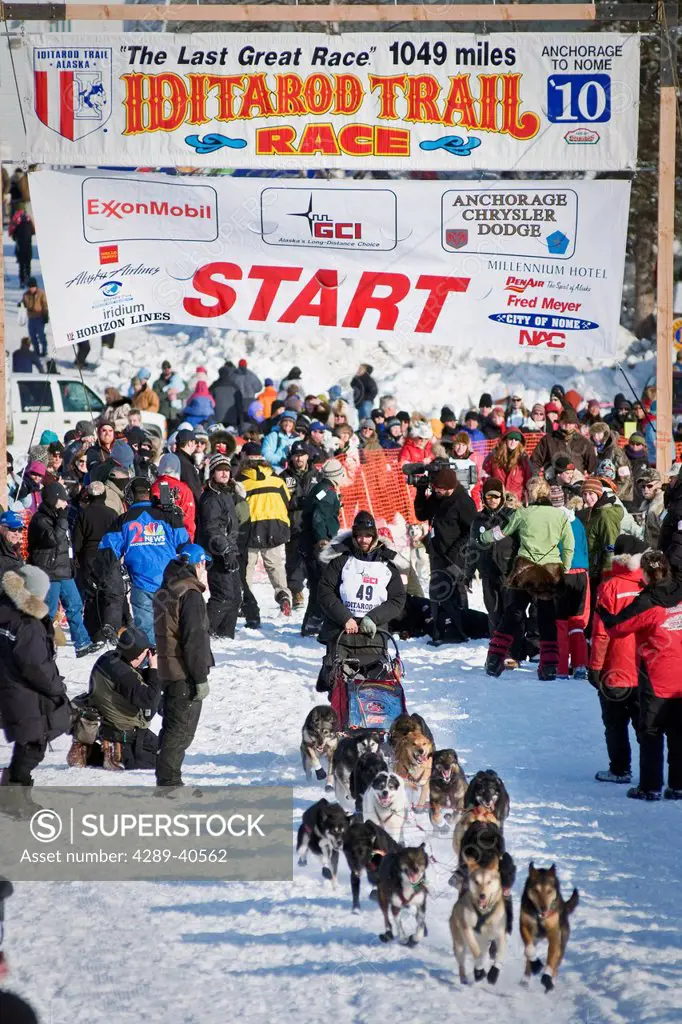 Lance Mackey Leaving The Start Line Of The 2010 Iditarod Re-Start In Willow, Southcentral, Alaska