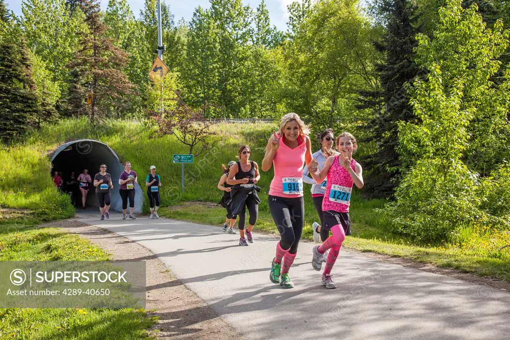 Women Runners Compete In A 5 Mile Race In The Alaska Run For Women On A Sunny Morning In Anchorage, Alaska, Southcentral Alaska. Photographed On The C...