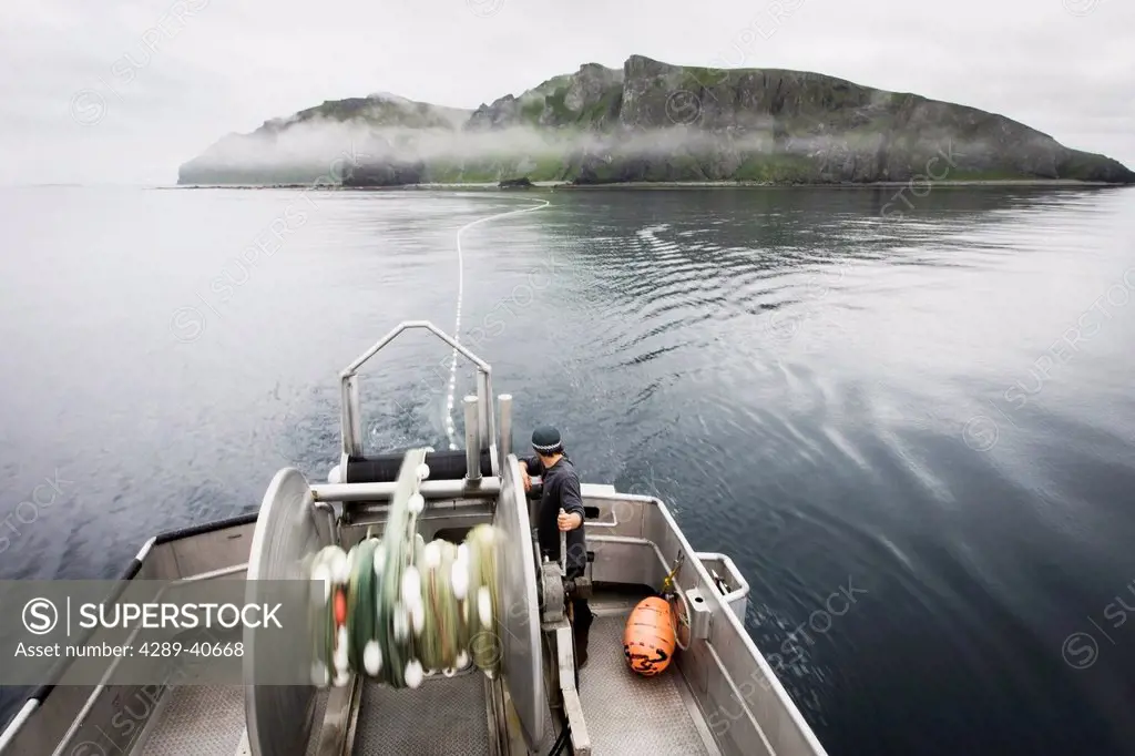 Setting Out The Gillnet While Commercial Salmon Fishing Near Cape Pankof On Unimak Island. Salmon Fishing In The Alaska Department Of Fish And Game 'a...