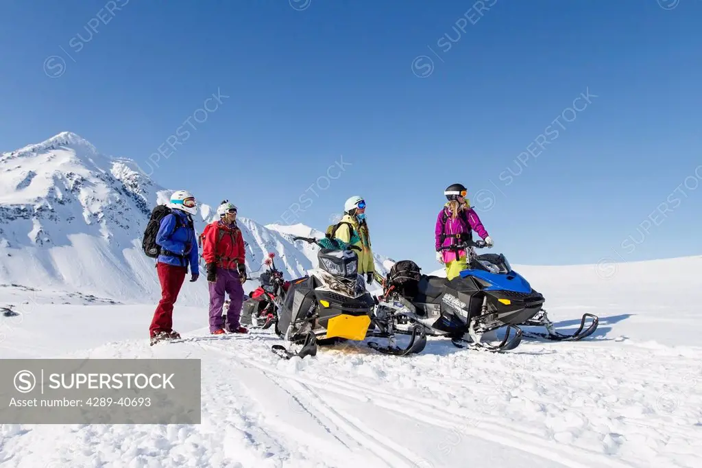 Lynsey Dyer, Sierra Quitiquit, Lizet Christiansen, And Lauren Georgelos On Their Snowmobiles Getting Ready For Some Backcountry Skiing In The Chugach ...