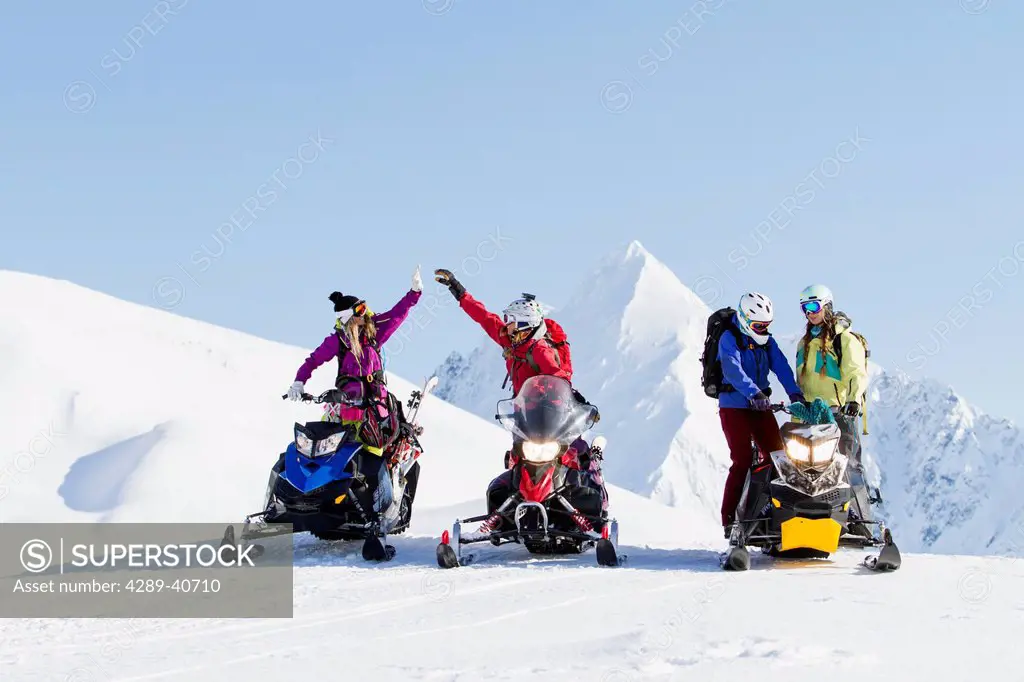 Lizet Christiansen, Sierra Quitiquit, Lynsey Dyer And Lauren Georgelos Hanging Out In The Chugach Mountains While Backcountry Skiing By Snowmobile, La...