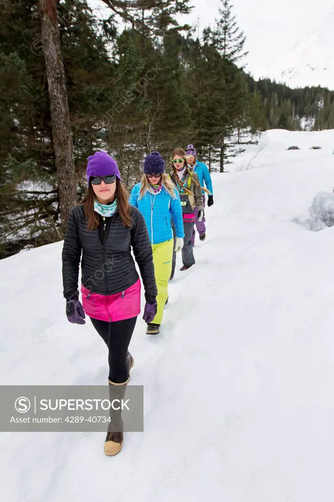 Lauren Georgelos, Lynsey Dyer, Sierra Quitiquit And Lizet Christiansen Hanging Out In Whittier While On A Backcountry Ski Trip By Snowmobile In Late W...