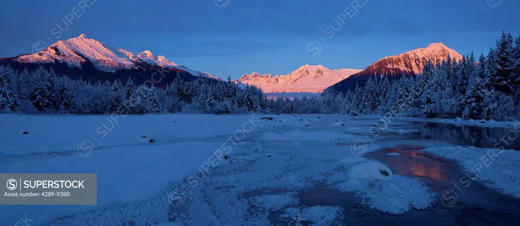 Panoramic view of alpenglow on the Coast Mountains and Mendenhall River in the foreground, Tongass National Forest, Southeast Alaska, Winter