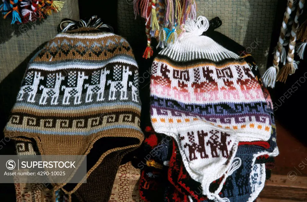 Woollen knitted hats on stall, Indian Market, Lima, Peru